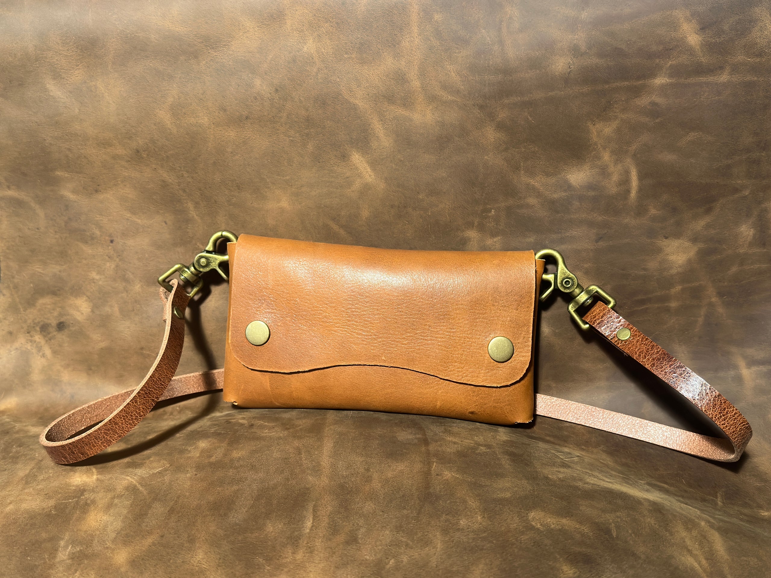 Leather clutch with strap hot sale
